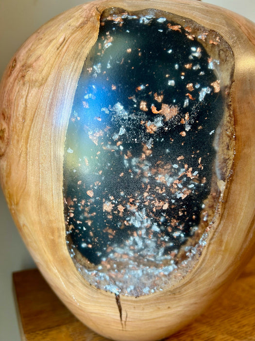 closeup of epoxy filled cherry urn