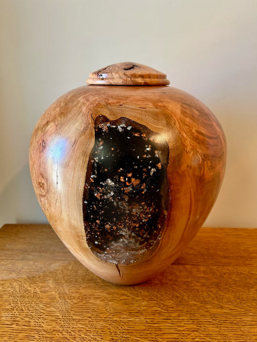 Front side of turned Cherry companion urn