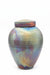 An iridescent ceramic urn with a matching lid, featuring a pearlescent finish that shifts between gold, green, blue, and purple, with reddish-orange marbling near the top, set against a dark gray background. Your urn will vary