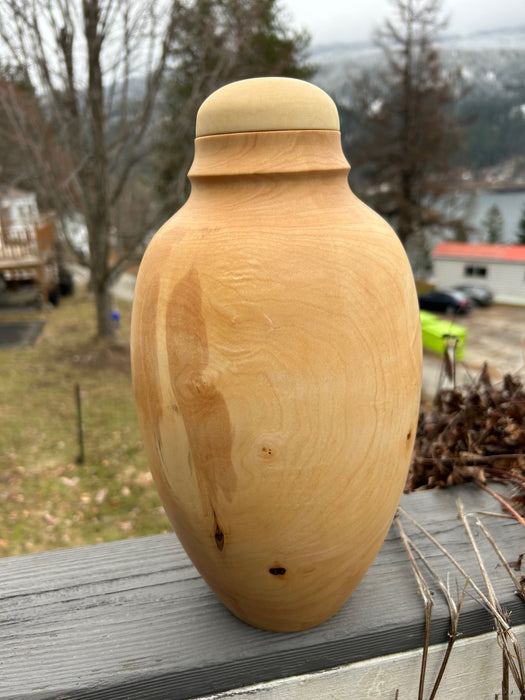 Wood turned urn in Maple