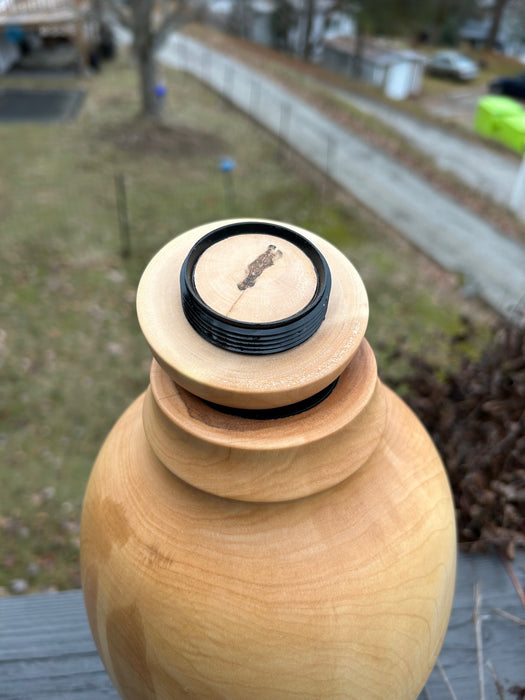 Maple turned urn with treaded top opening lid