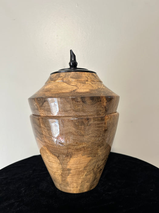 Spalted Maple turned urn in the emergence shape