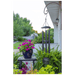 Black Personalized Memorial Wind Chime in outdoor setting front side of the engraved disk