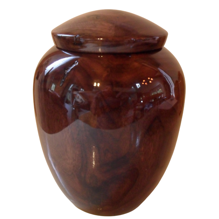Hand turned Walnut  urn with gloss finish