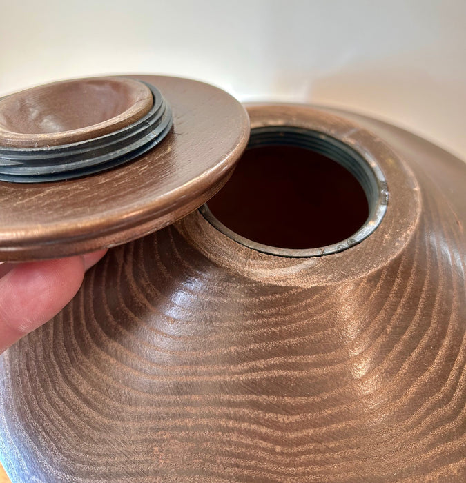 Comes with top opening threaded lid