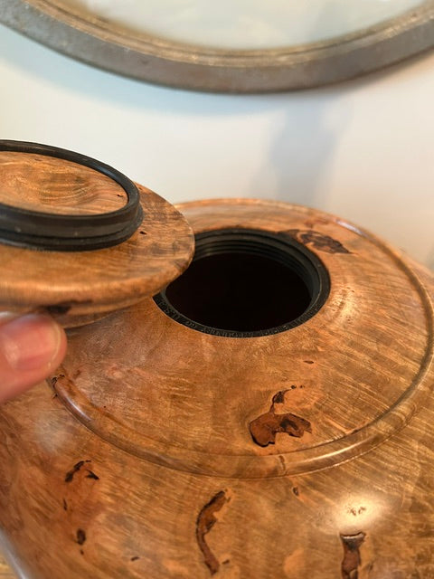 Comes with a top opening threaded lid