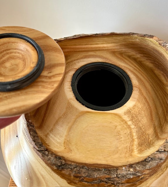 Comes with a top opening threaded lid