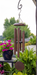 Antique Copper Personalized Memorial Wind Chime in outdoor setting