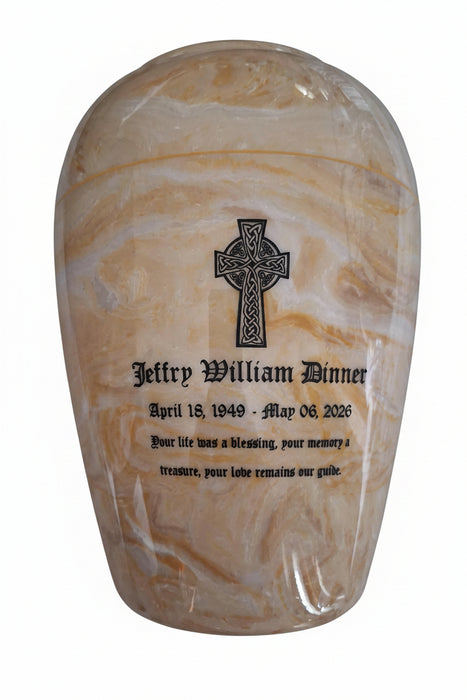 Marble-patterned urn with engraved text and cross design on a gray background