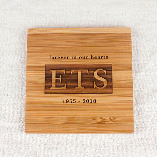 Engraved with "Forever in our hearts" plus initials and dates