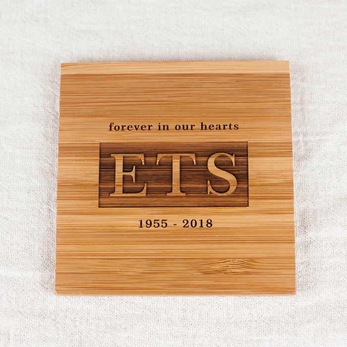 Engraved with "Forever in our hearts" plus initials and dates