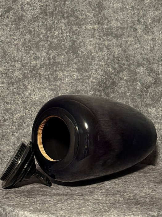 Comes with top opening threaded lid