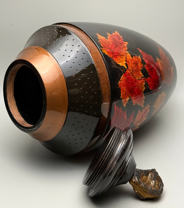 Comes with a top opening threaded lid